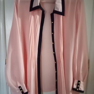 Gorgeous two-piece blouse that you would love this set color coral and black